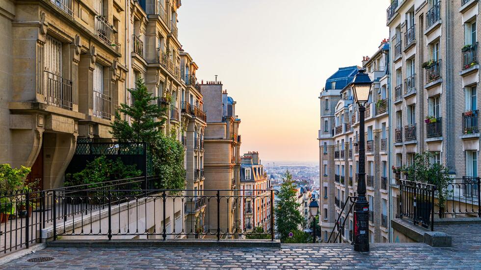 A hilltop street at dusk in Montmartre