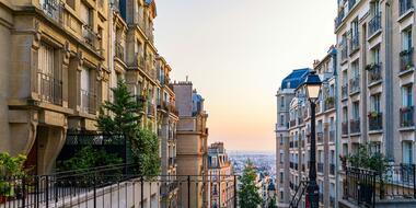 A hilltop street at dusk in Montmartre