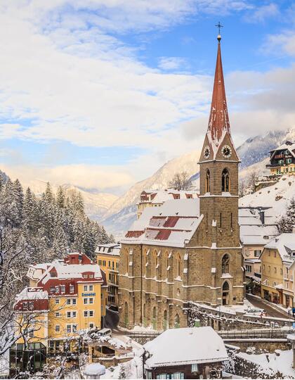 A snow-covered church in the mountains