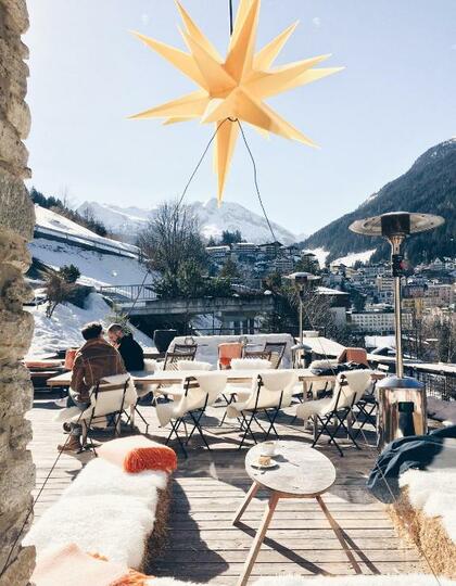 A snowy restaurant terrace