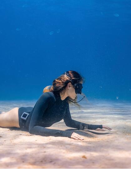 Katharina under the ocean in Menorca