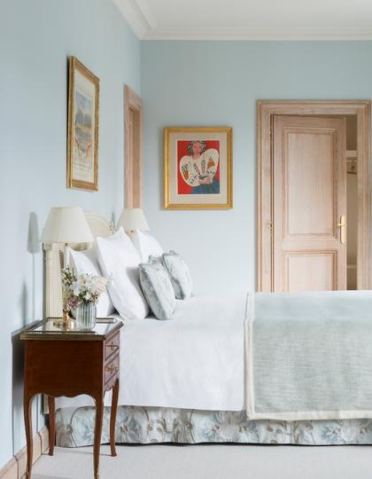 A baby blue bedroom  at Hotel Le Bristol in Paris