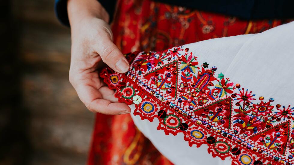 An intricately embroidered skirt edge