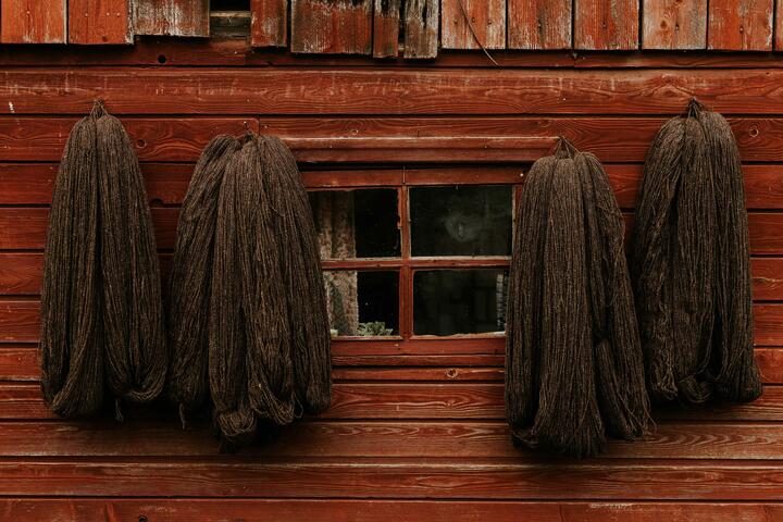 Yarn hanging outside a hut