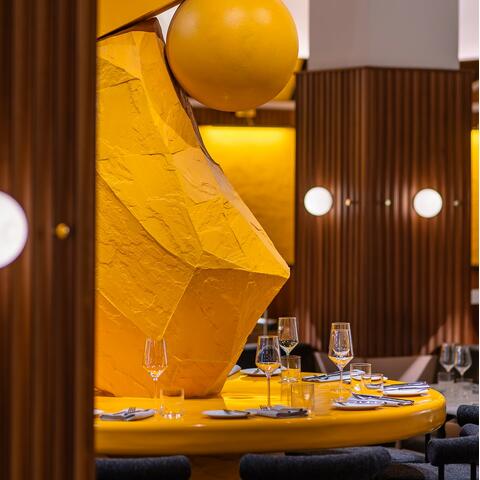 Yellow sculpture at the heart of One Hundred Shoreditch's restaurant