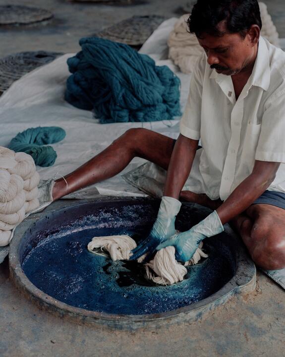 The indigo dyeing process at The Colours of Nature, Tamil Nadu, India