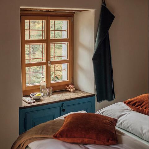 A bedroom at Corippo Albergo Diffuso