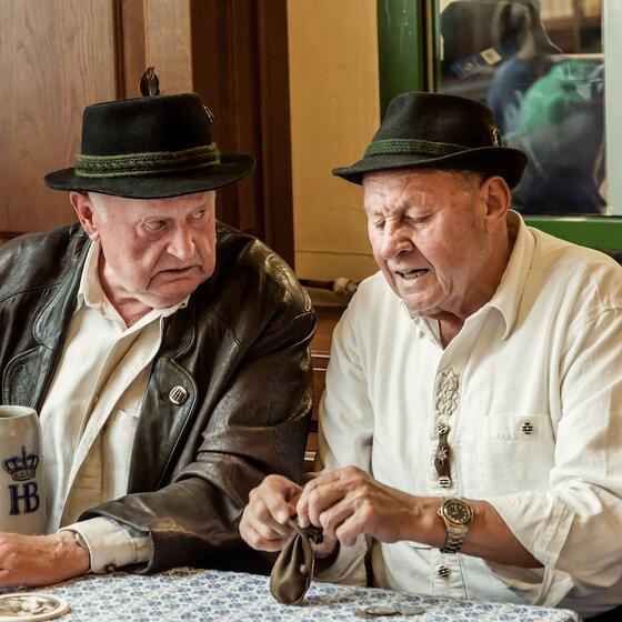 Müncheners enjoying a stein of beer